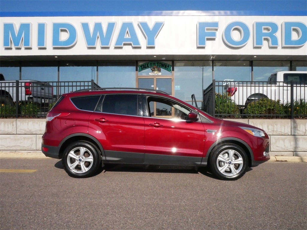 Used 2016 Ford Escape SE with VIN 1FMCU9G94GUC11579 for sale in Roseville, Minnesota